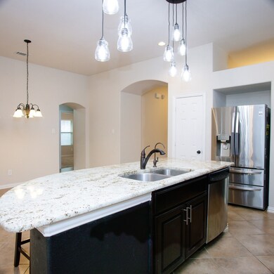 Open kitchen with great lighting.