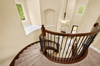 This is not your typical view from the second story to the front entry. The designers paid as much attention to the function of this elaborate staircase as they did to the unique architectural style.
