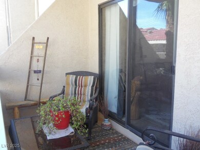 Property entrance featuring stucco siding