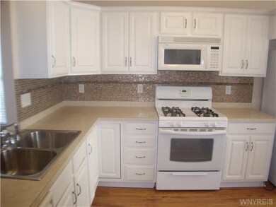 Kitchen. All appliances stay (range, refridgerator and dishwasher.