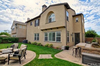 Entertainer's Backyard with stone fireplace, built