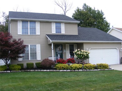 Great curb appeal, with plush landscaping. Vinyl s