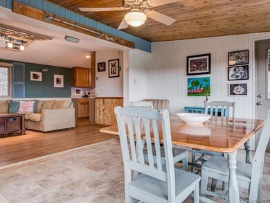 View towards living space/kitchen from sunroom.