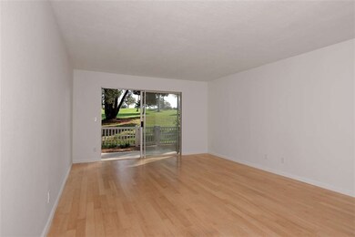 Sliding door to backyard/patio overlooking golf co