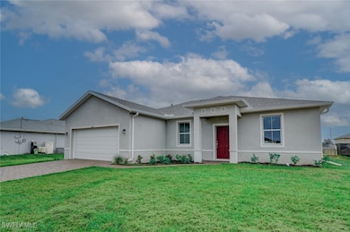 View of front of property featuring a garage and a