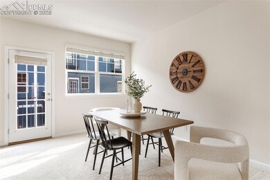 Currently staged as dining area, this room also wo