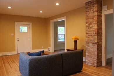 Living room has original hardwood floors, just ref