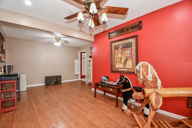 Just off the entrance is a large open bonus room with pretty wood flooring that could be most anything you needed it to be. Or use it as originally intended formal living and dining rooms.