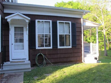 Exterior Side View. Sunny side...