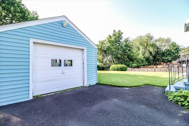 Oversized one car garage with electric door opener