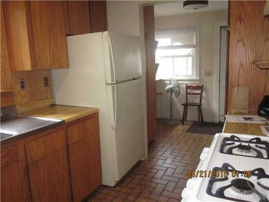 Kitchen. Looking towards entrance area at back doo