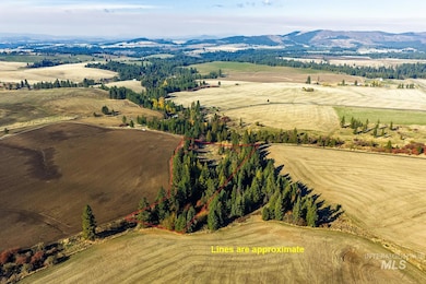 View of rural area with property boundaries highlighted and a mountainous background
