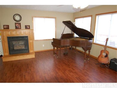 Great looking floor in family room with gas firepl
