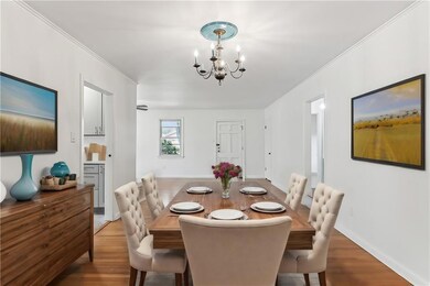 Dining room is virtually staged.