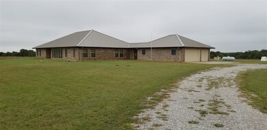 5931 N Ridgeback Rd, Marlow, OK 73055 - photo 2
