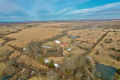 Aerial view with a rural view and a water view