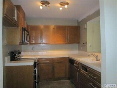 Kitchen with tiled counter tops