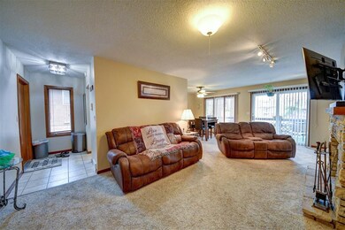 Tiled entryway, plenty of daylight and open to the