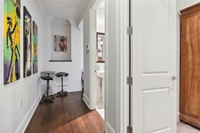 Entry hallway to unit Q with second bedroom and ba