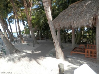 Beach area and walk way to pool.