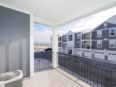 938 W Coral Charm Way unit L203, Saratoga Springs, UT 84045 - photo 2