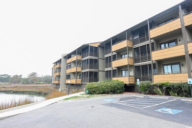 View of building exterior featuring a water view