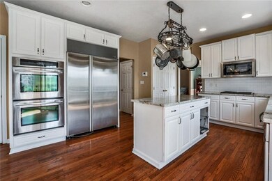 Gourmet kitchen complete with Sub Zero fridge, gra