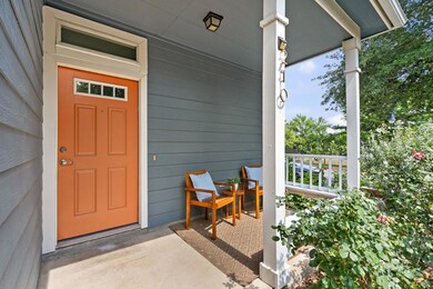 Doorway to property featuring a porch