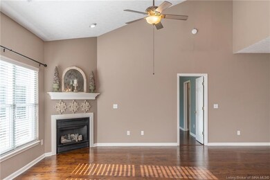 Living room area with ceiling fan.