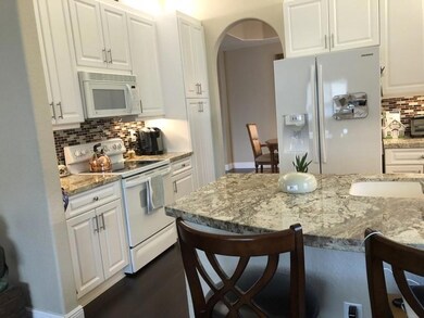 Kitchen - Note: granite counters & white cabinets