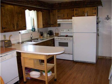 Kitchen. Eatin Kitchen with Hardwood Floors.