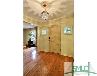 Other. Formal foyer entrance with crystal chandeli