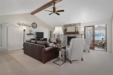 Vaulted great room with wood beam and newer stacke