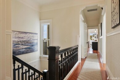 Top two floors in 3-unit building.