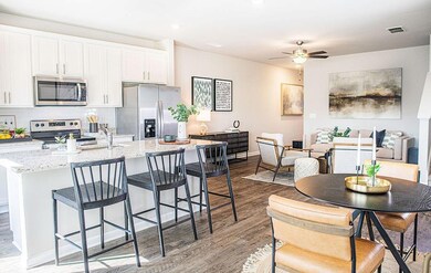 Kitchen featuring stainless steel appliances, wood