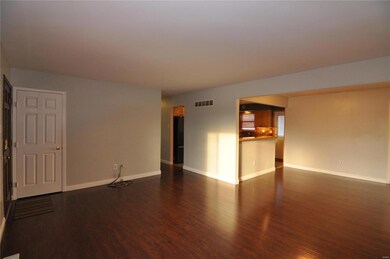 Opposite angle of living room, dining room & openi