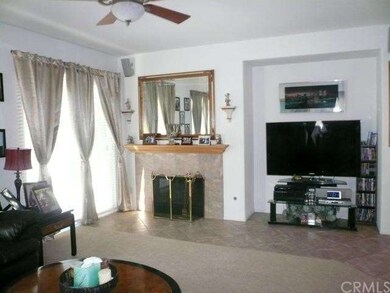 Big family room with diagonal tile floors, carpet 