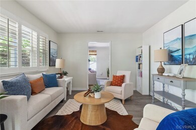 Living room featuring a wealth of natural light an