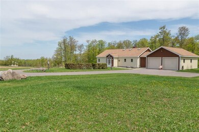 Exterior Front, pole barn on left