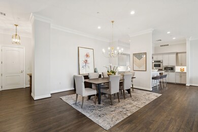 Dining space featuring a chandelier, ornamental molding, recessed lighting, and dark wood-style flooring