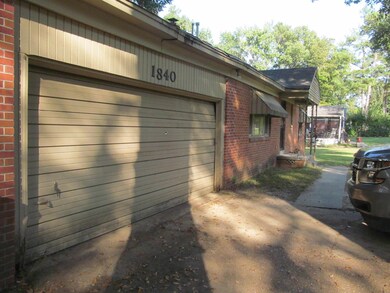 View of home's exterior with a garage