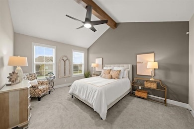 Primary Bedroom on main floor. Photos from a previous model. Finishes and colors will not be the same in the final product. 