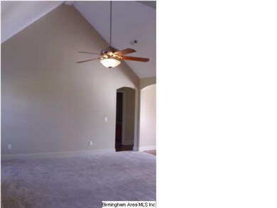 Dramatic vaulted ceiling in great room.