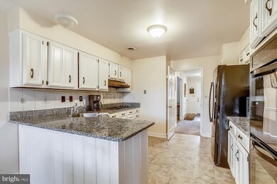 15313 Merrifields Ct, Silver Spring, MD 20906 - photo 6