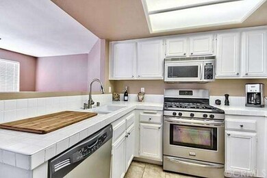 European style kitchen opens to the living and din