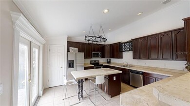 CUSTOM KITCHEN NEW REFRIGERATOR, NEW DISHWASHER, AND NEW MICROWAVE! THOSE FRENCH DOORS TAKE YOU OUT TO A HUGE BALCONY OVERLOOKING THE POOL!!