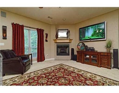 Den/Family/Great Room. Large family room w/corner fireplace and access to oversized deck.
