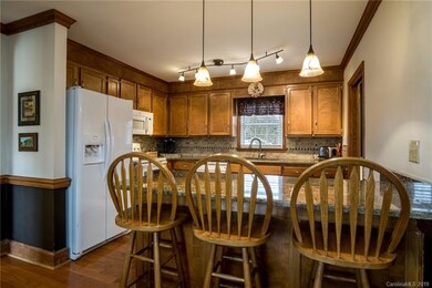 Beautiful cabinetry complimented by Granite Counte