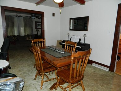 DINING ROOM HAS ROOM FOR A LARGE FAMILY TABLE AND 