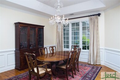 Spacious Dining Room with tray ceiling is able to 